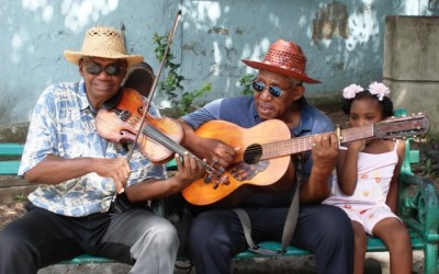 Men playing guitars, cuba