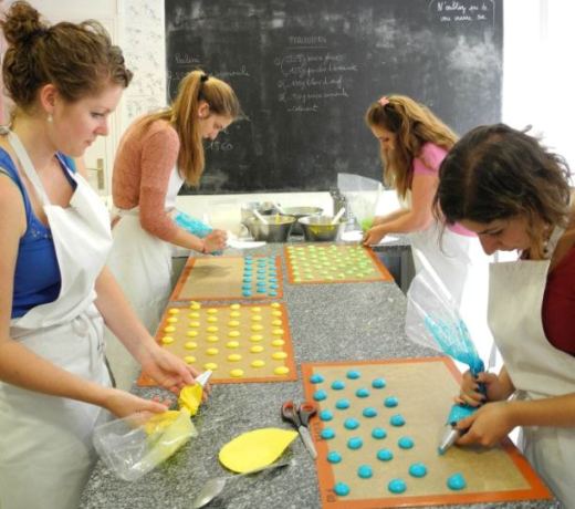 Girls making macarons